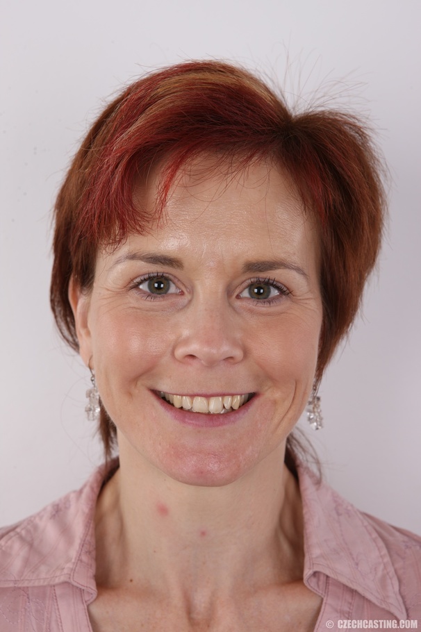 Redhead MILF slowly strips off her pink blo - XXX Dessert - Picture 1