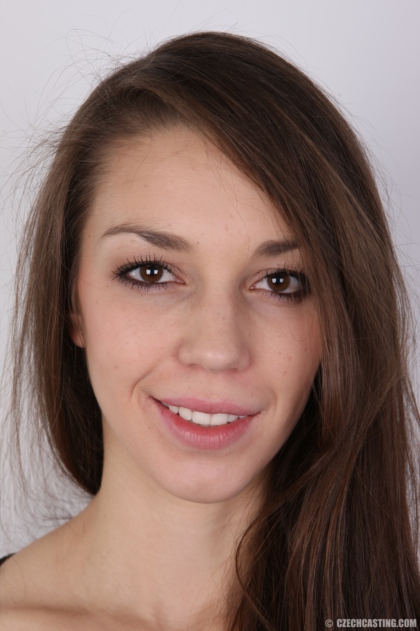 Teen brunette strips off her brown mini dre - XXX Dessert - Picture 1