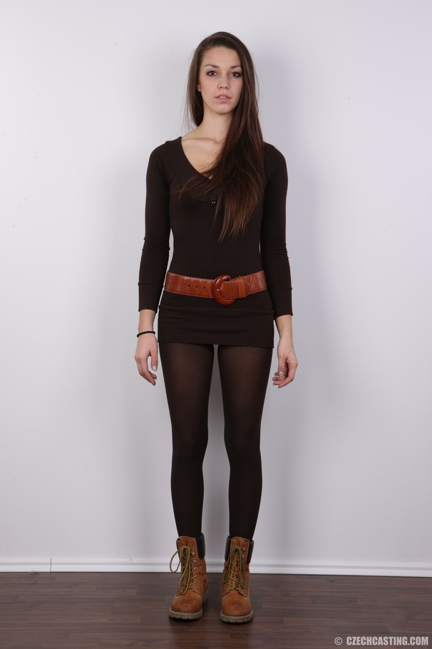 Teen brunette strips off her brown mini dre - XXX Dessert - Picture 2