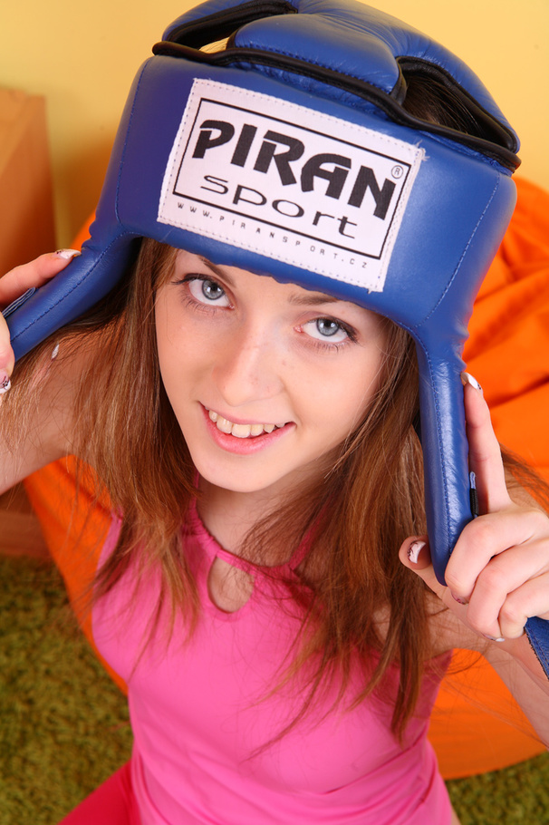 Hot teen shows her perfect curves in tight pink blouse and leggings while wearing her blue head gear and black boxing gloves then she takes them off piece by piece and expose her amazing body with indulging tits and pussy as she lays naked on a green carpet. - XXXonXXX - Pic 7