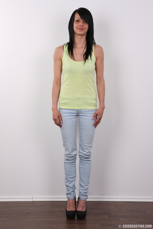 Alluring dame in a green top, faded jeans a - XXX Dessert - Picture 2