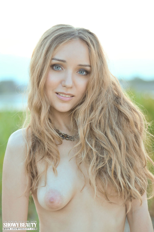 Skinny chick wearing brown leather belt pose naked on a grassy field and shows her petite tits and ravishing twat in different positions. - XXXonXXX - Pic 18