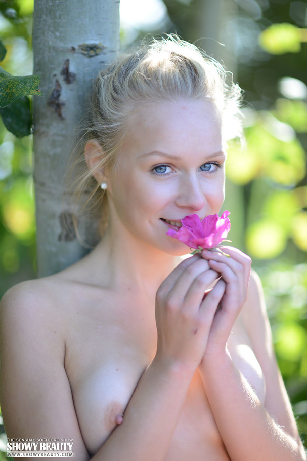 Stunning babe with blonde hair displays her banging body before she removes her white shirt and shows her small boobs then peels down her pink panty and shows her lusty pussy in different naked poses at the beach. - XXXonXXX - Pic 20