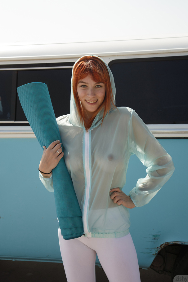 Red teeny in white pants enjoys yoga on the - XXX Dessert - Picture 12