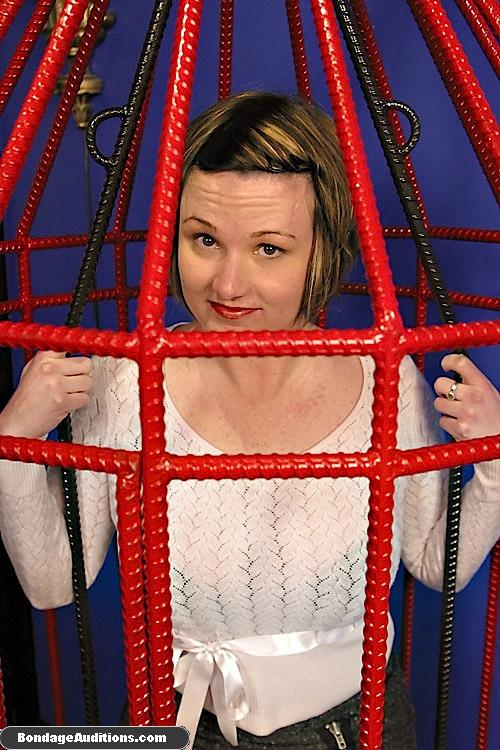 Caged beauty gets a really nice caning sess - XXX Dessert - Picture 1