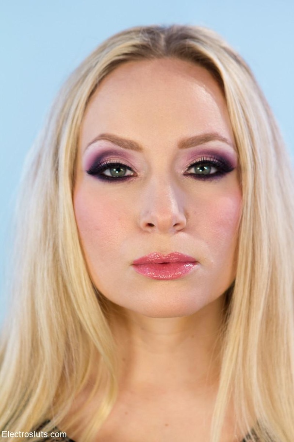 Ball-gagged babe in a head restraint feels  - XXX Dessert - Picture 5