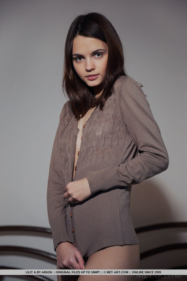 Beautiful teen opens her brown shirt then s - XXX Dessert - Picture 1