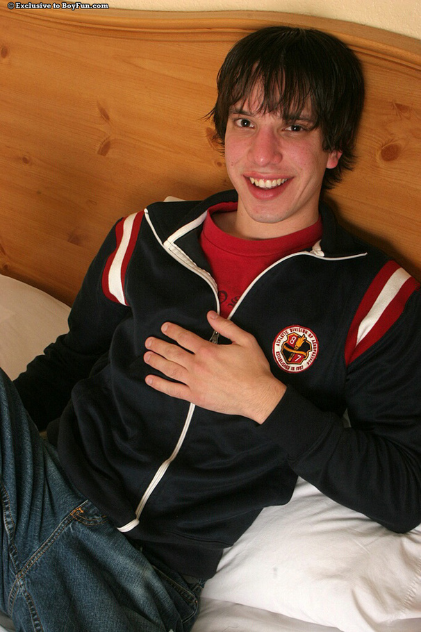 Black-haired model jerks off his cock on the couch in his free time - XXXonXXX - Pic 1