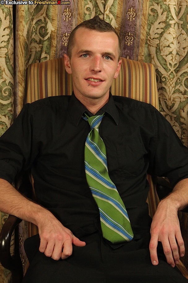 Gorgeous dude sits on a brown striped chair then strips off his black shirt, pants and brief then reveals his hunk body while he wanks his big cock wearing his green tie. - XXXonXXX - Pic 1