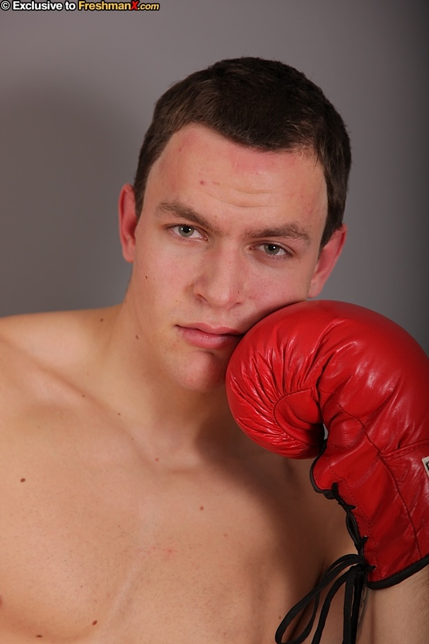 Gorgeous stud with big hard body takes off his black head gear, red and white shorts and black and white supporter then reveals his huge dick while he pose naked wearing his red boxing gloves. - XXXonXXX - Pic 3