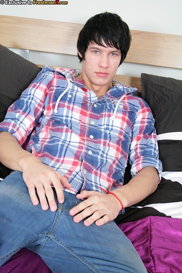 Stunning guy lays on a purple bed then strips off his blue and white checkered shirt and jeans and teases with his hunk body before he takes off his white brief and pumps his dick hard. - XXXonXXX - Pic 2