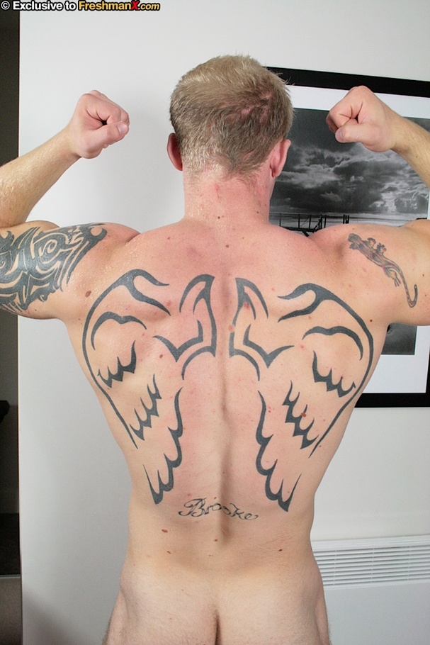 Blonde hunk sits on a black couch wearing his gray shirt and jeans then strips them off and shows his muscular body with big hard muscles before he grabs his uncircumcised dick and wanks it. - XXXonXXX - Pic 9