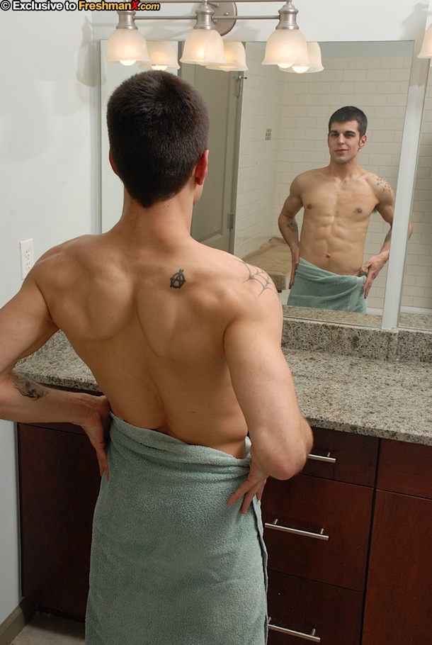 Gorgeous dude displays his slim muscular body while he rubs it with soap before he wanks his dick as he takes a bath in a tub. - XXXonXXX - Pic 1