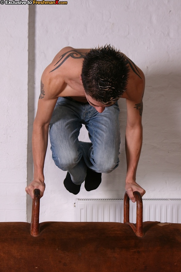 Cute dude in pink and black shirt and jeans slowly takes them off and shows his skinny hard body before he pulls down his pink and gray boxers and shows his large cock as he sits naked on a brown pommel horse. - XXXonXXX - Pic 4