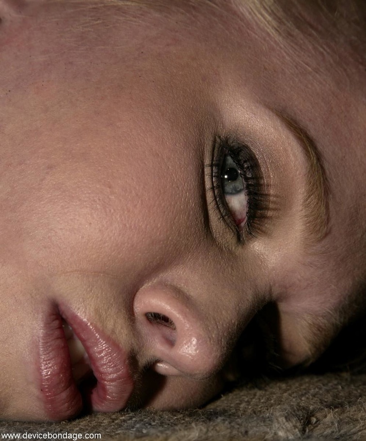 Bars and leather straps keep this great-looking blonde in one place for her slave training. - XXXonXXX - Pic 9