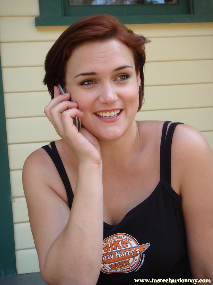 Sexy redhead in black enjoys bottle of beer - XXX Dessert - Picture 1