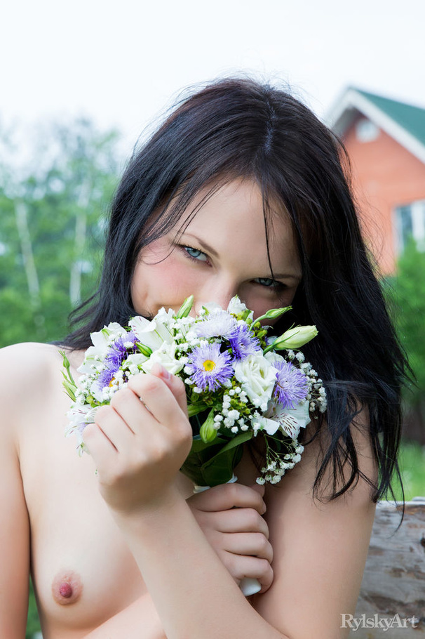 Fresh babe poses nude in garden on wooden c - XXX Dessert - Picture 15