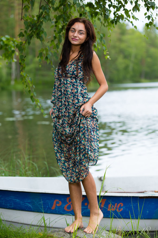 Brunette in long floral gown strips sensual - XXX Dessert - Picture 2