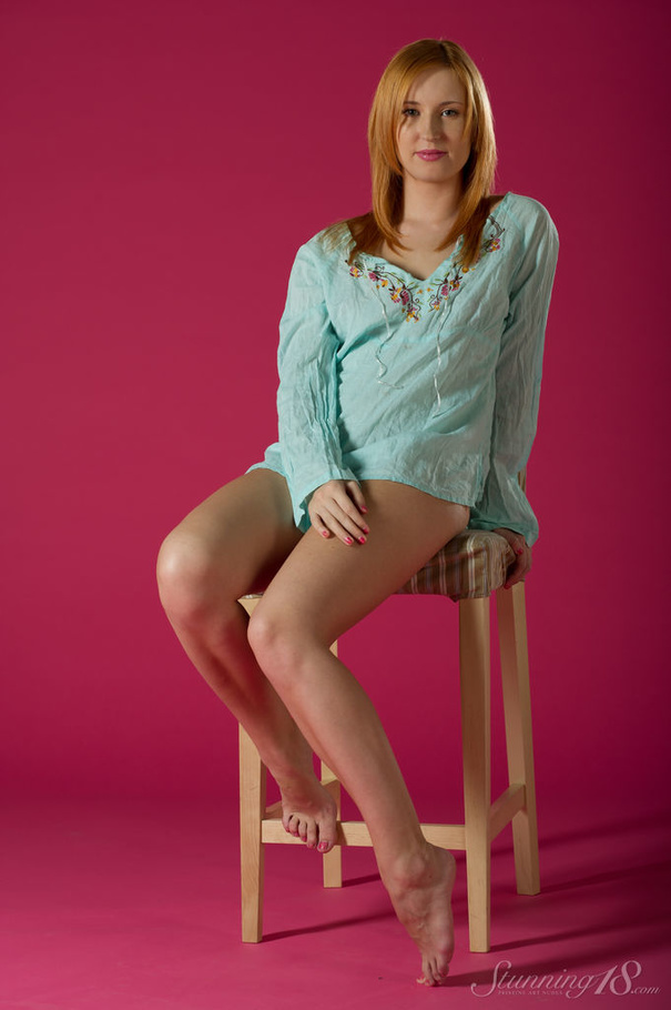 Redhead in a blue top displays her lovely a - XXX Dessert - Picture 1