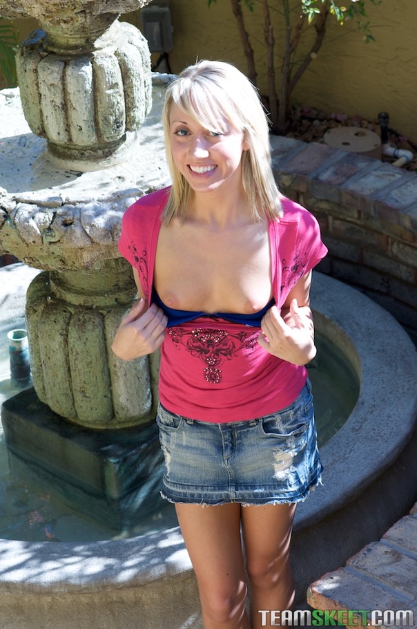 Flat-chested blonde goes without panties in a garden to show off her assets - XXXonXXX - Pic 10