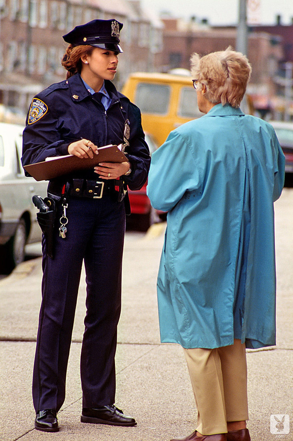 Naughty police officer plays around with her police stick between juicy breasts - XXXonXXX - Pic 2