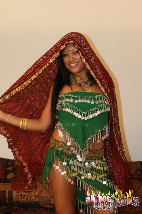 Hot indian babe in green outfit stripteasing and exposing her big tits and shaved pussy under black panty - XXXonXXX - Pic 1
