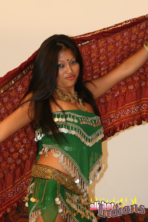 Hot indian babe in green outfit stripteasing and exposing her big tits and shaved pussy under black panty - XXXonXXX - Pic 2