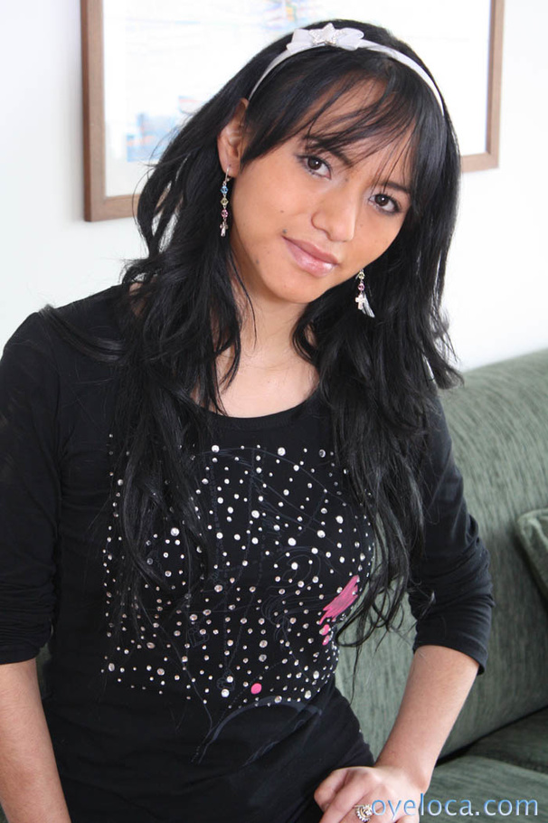 Long haired gal in black lingerie posing and undressing on the couch and then enjoying deep pussy fucking on the grey couch - XXXonXXX - Pic 1