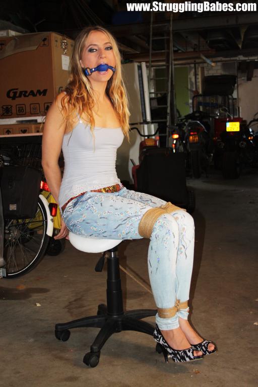 Fresh blonde in blue top and pants chair bound, gagged with boobs squeezed - XXXonXXX - Pic 1