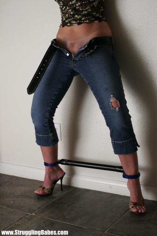 Tasty blonde in sexy top and jeans pants bound hands and legs apart - XXXonXXX - Pic 7