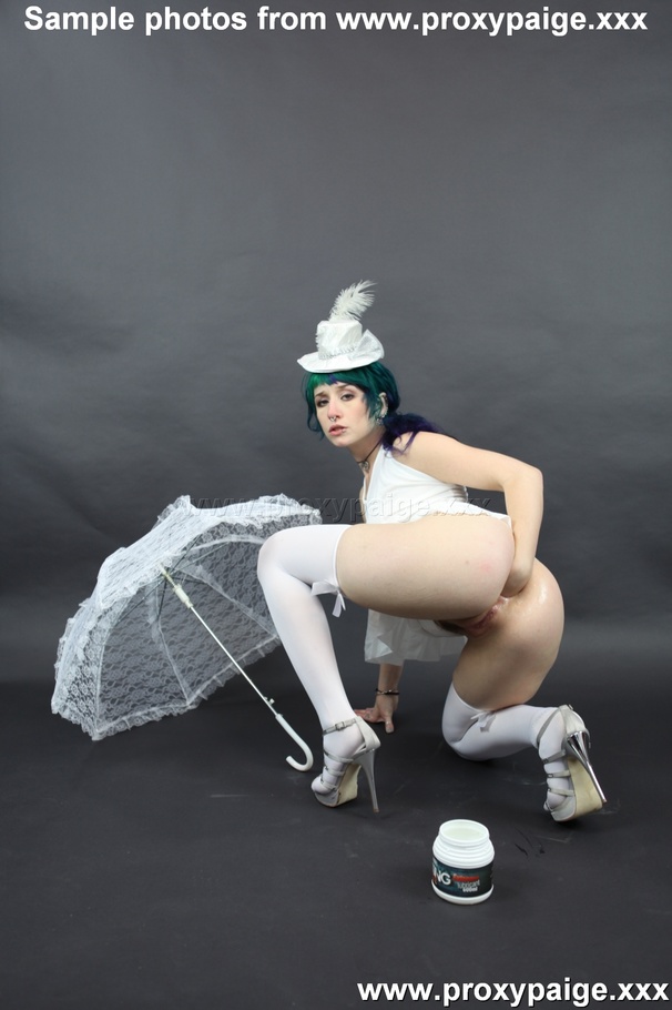 Teen cutie in white suit, hat, stockings and umbrella playing with her asshole prolapse - XXXonXXX - Pic 2