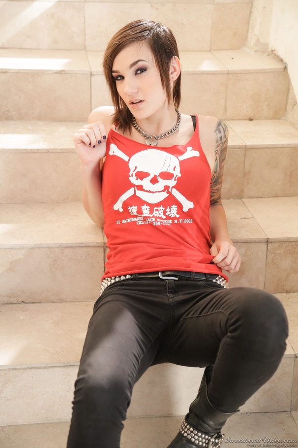 Butchy-looking brunette lesbian posing on the stairs - XXXonXXX - Pic 3