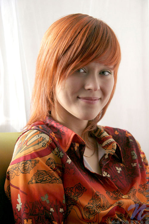 Enjoyable redhead wearing orange top and bu - XXX Dessert - Picture 1