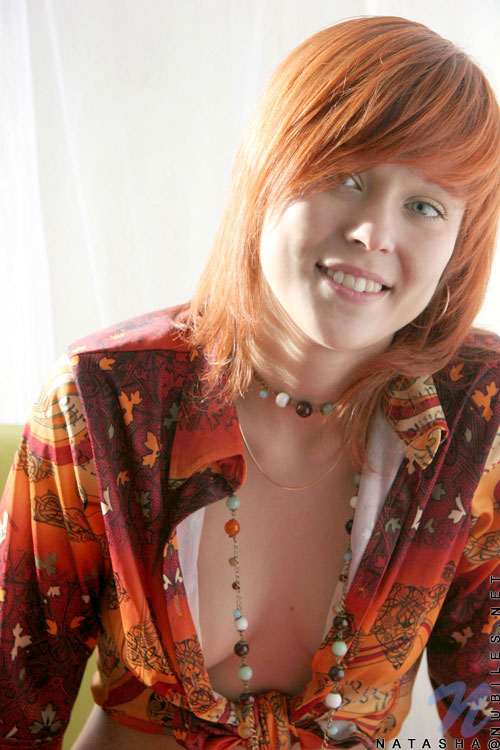 Enjoyable redhead wearing orange top and bu - XXX Dessert - Picture 2