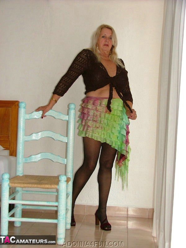 Slutty blonde cougar is wearing sexy stockings while teasing with her large saggy tits - XXXonXXX - Pic 4