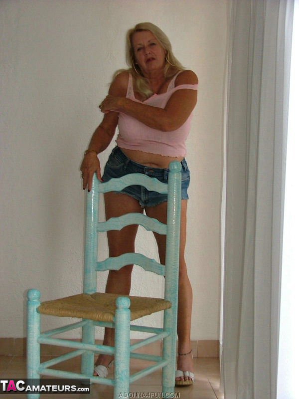 Naughty blonde cougar takes off her top to expose her large bazookas - XXXonXXX - Pic 5