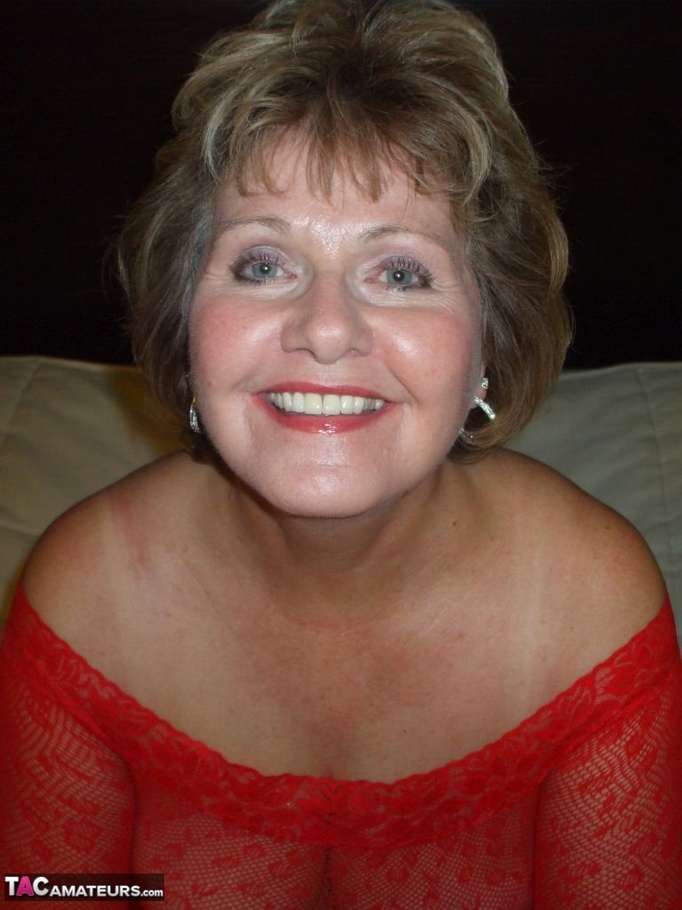 Blonde granny teases with her massive tits while wearing red clothes - XXXonXXX - Pic 2
