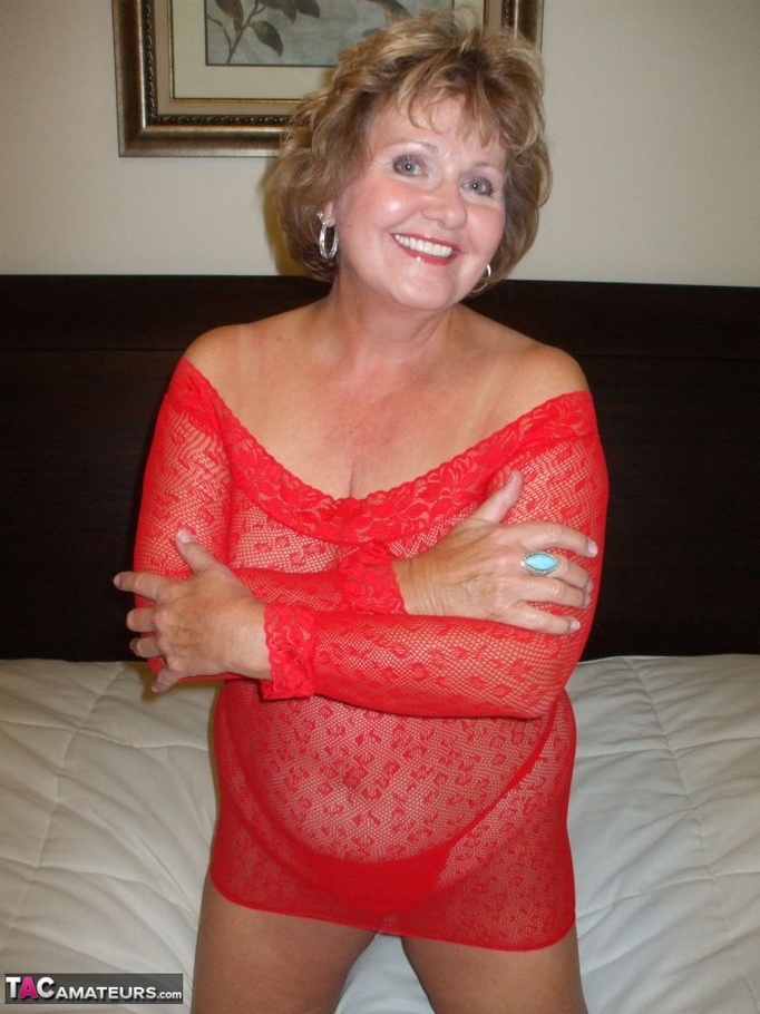 Blonde granny teases with her massive tits while wearing red clothes - XXXonXXX - Pic 3