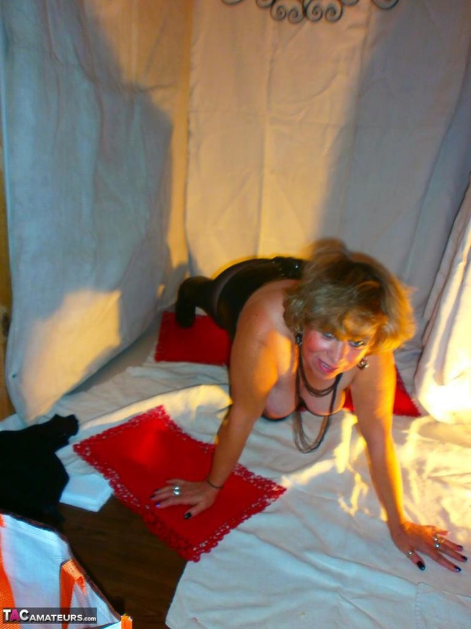 Lusty mature bitch with huge tits is seen wearing sexy lingerie and leather boots - XXXonXXX - Pic 14