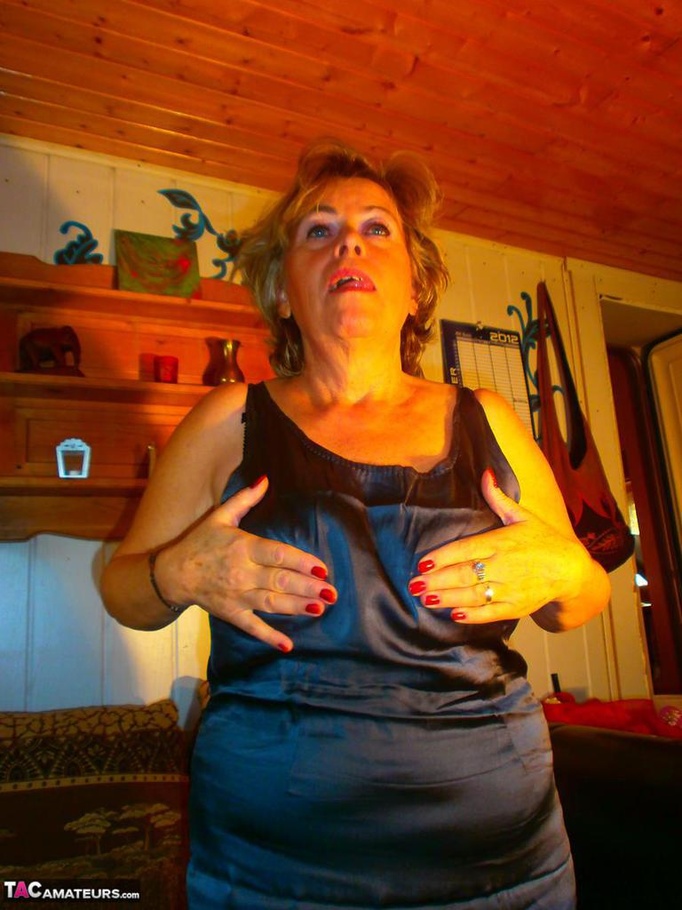 Mature blonde bitch is wearing glasses while fondling her massive boobs - XXXonXXX - Pic 12