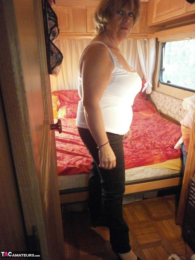 Blonde mature bimbo poses wearing nothing but a pair of sexy white stockings - XXXonXXX - Pic 1