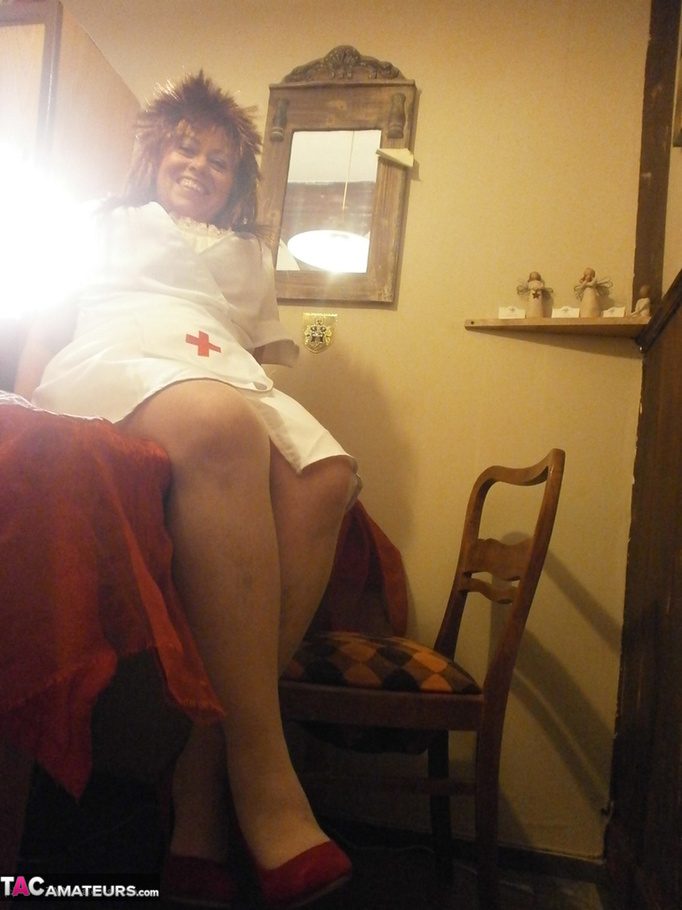 Naughty mature nurse touches her big boobs and shows her fanni to the cam - XXXonXXX - Pic 2