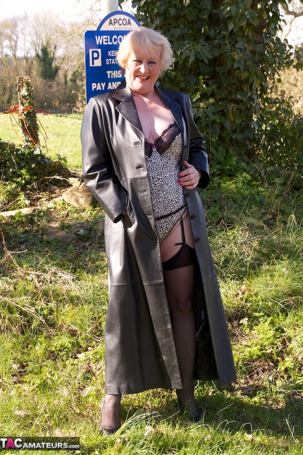 Mature bimbo with big breasts poses in sexy lingerie near a highway - XXXonXXX - Pic 5