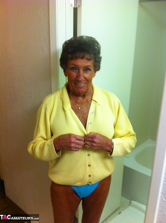 This tattooed slut, with short hair, shows off her wrinkly body - XXXonXXX - Pic 10