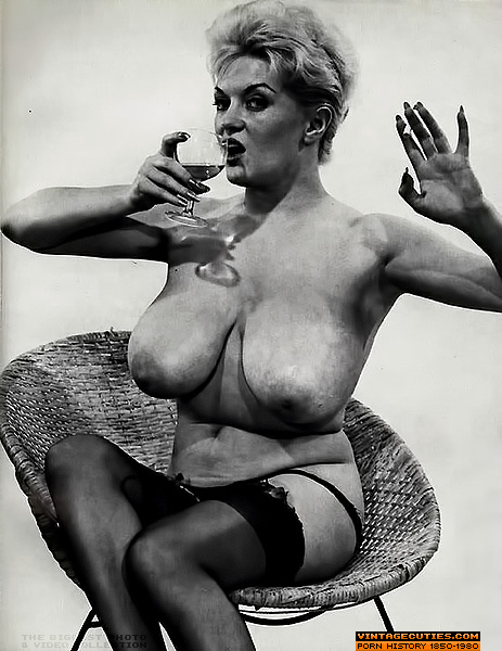 This busty blonde, with giant tits, leans c - XXX Dessert - Picture 1