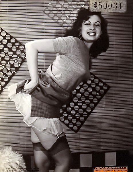 This elegant, young, brunette poses and smi - XXX Dessert - Picture 5