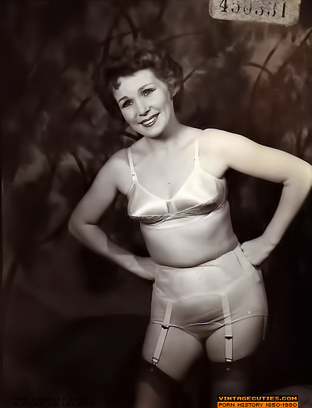 This elegant, young, brunette poses and smi - XXX Dessert - Picture 6