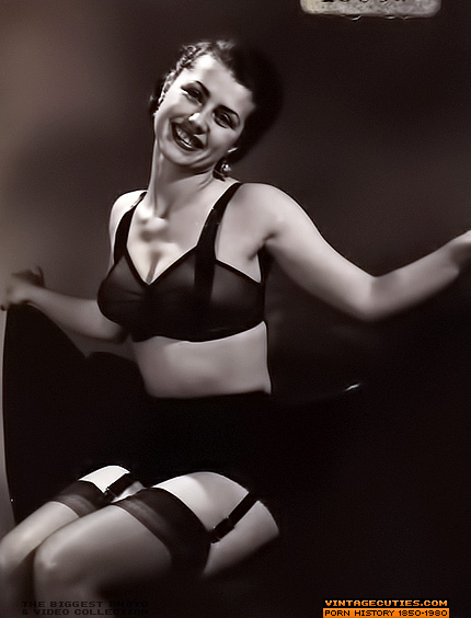 This elegant, young, brunette poses and smi - XXX Dessert - Picture 8