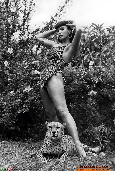 Wild brunette slut in leopard outfit poses  - XXX Dessert - Picture 2