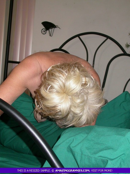 Blonde granny with soggy tits and fat body teases her hubby as she gets on a green bed naked and rides on a sybian. - XXXonXXX - Pic 7